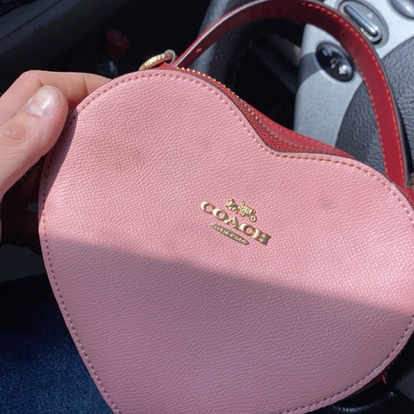 I am selling my coach bag. It is pink and red. Its a great Valentine’s Day gift. - Picture 4 of 4